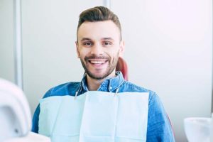 happy man receiving general dentistry services