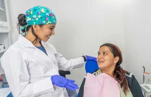 woman receiving periodontics treatment