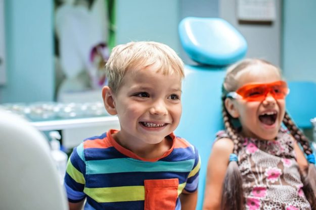pediatric orthodontist (1) brother and sister visiting a pediatric orthodontist