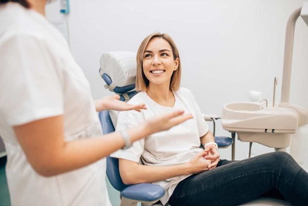 dental emergency (3) a woman is happy she got treatment for a dental emergency