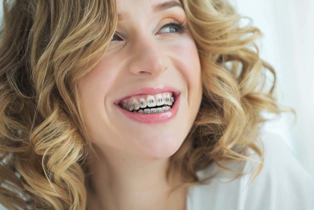 3 Benefits of Adult Orthodontic Services (2) woman learning about adult orthodontics